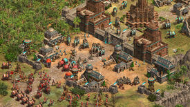 A screenshot of Age Of Empires II: Definite Edition's Dynasties Of India DLC showing elephants in red and blue facing off.