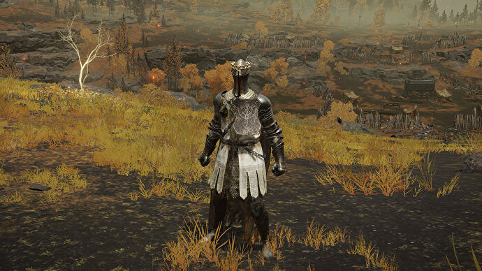The player in Elden Ring stands in front of the camera wearing the Haligtree Knight armour set. Behind them is a view of the Altus Plateau.