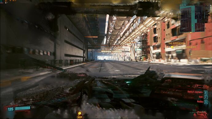 An AI-generated frame of DLSS 3 running over Cyberpunk 2077. The interior of a car is blurred due to the rapid frame-to-frame change of a camera transition.